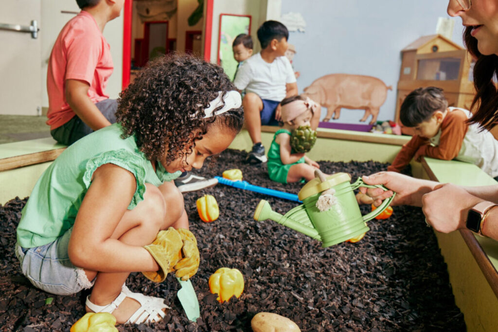 girl-in-farm-with-other-kids